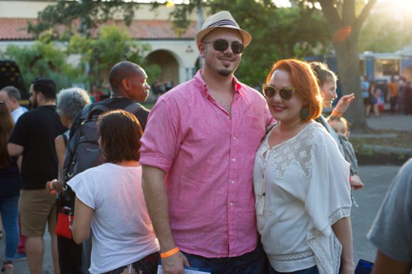 A man and woman at the block party in the Vizcaya Village.