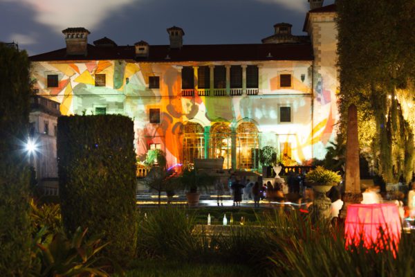 Vizcaya's Main House is illuminated with light projections during Spectral Vizcaya