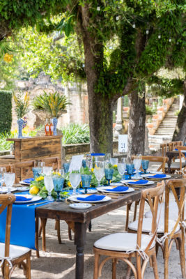 A long table set for lunch in Vizcaya's gardens