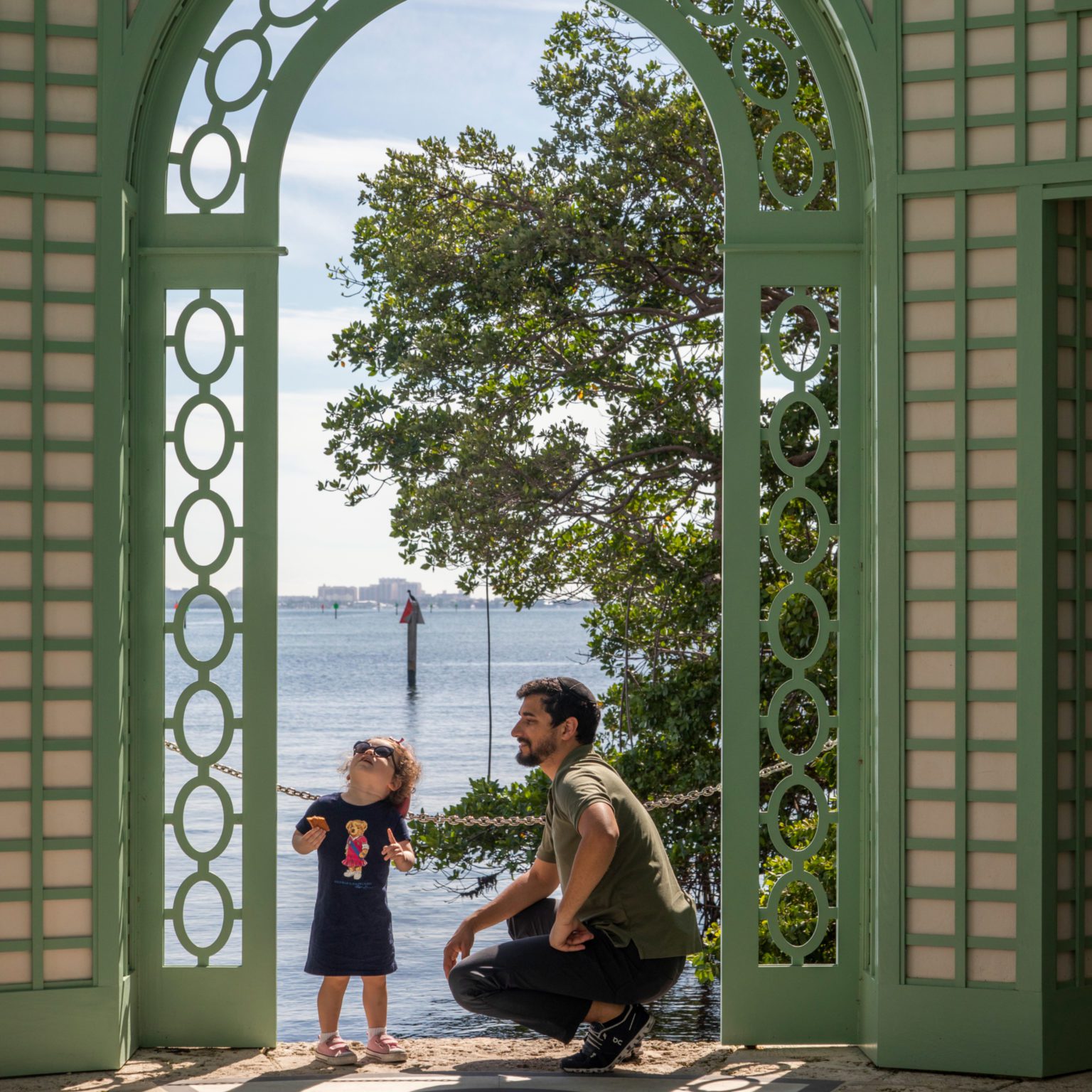 A father and son explore the Tea House by Vizcaya’s waterfront