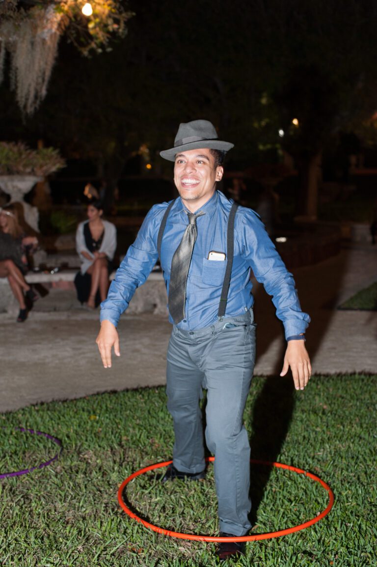 A man dressed in suspenders and a fedora for the Seersucker Social