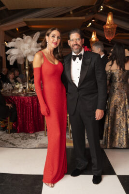 A man and woman attending the Vizcaya Ball, posing for a photo at the formal event.