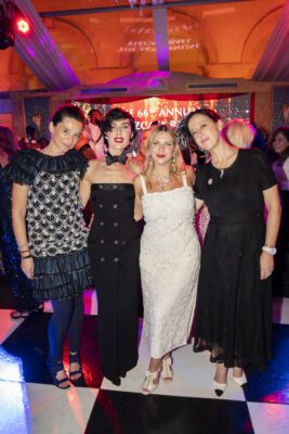 A group of women posing for a photo at the Vizcaya Ball.