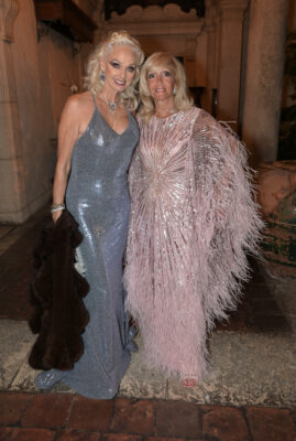 Two women standing next to each other at the Vizcaya Ball.