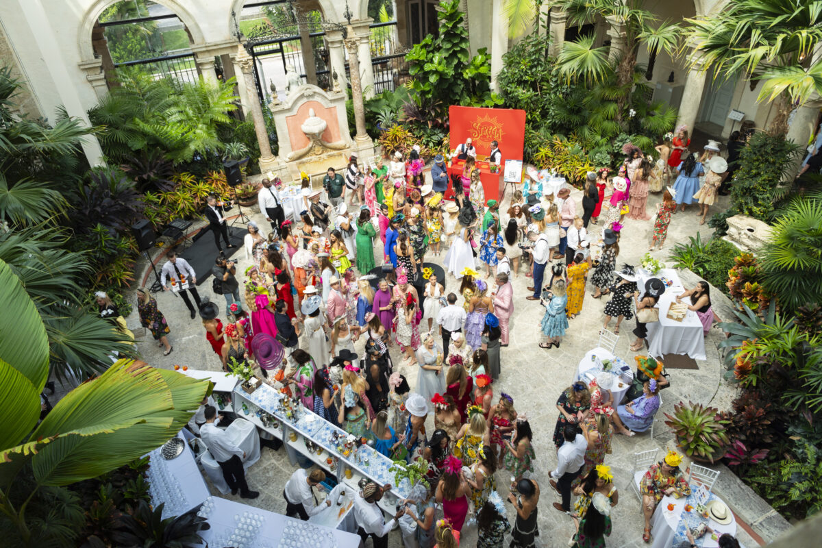 A large group of people in the Main house courtyard