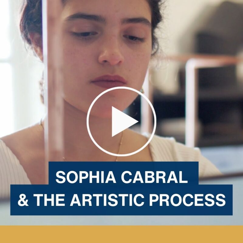 Close up a woman's face with the words "Sophia Cabral and the artistic process."