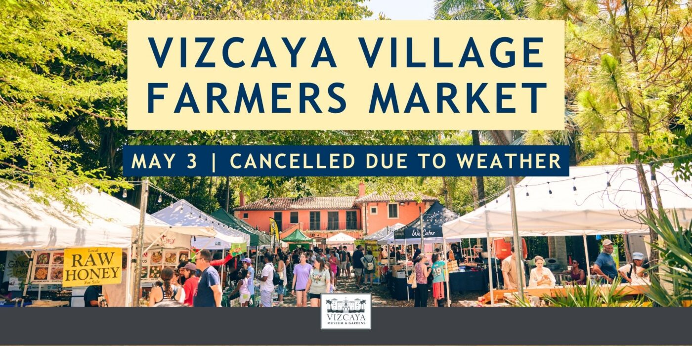 Outdoor farmers market with white tents and visitors; a banner announces May 3 Vizcaya Village Farmers Market is cancelled due to weather.
