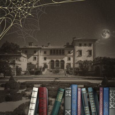 Vizcaya at night with a full moon, spider webs in the corner, and a row of ornate books in the foreground.